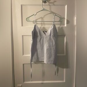 NWT (never worn) Brandy Melville blue and white striped tank top Retails for $24